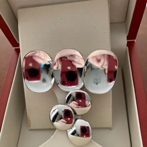 Sarah Coventry clip-on mirror silver earrings.